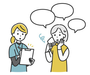 ヒアリングをする女性医療スタッフと高齢者女性