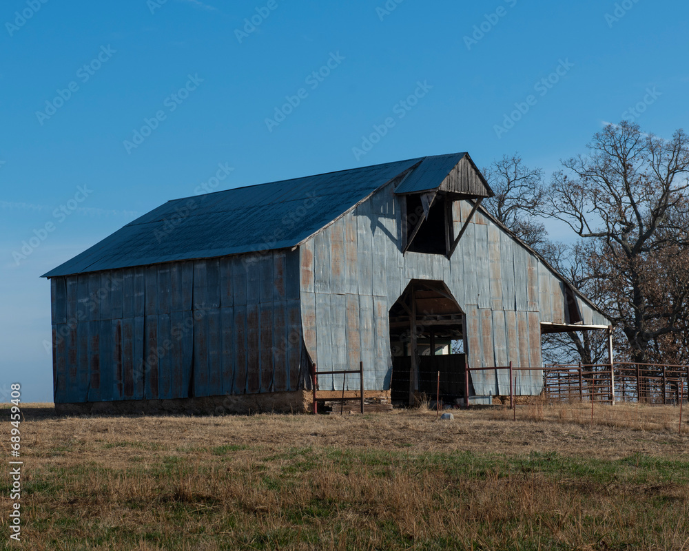 Wall mural Metall Barn on a farm