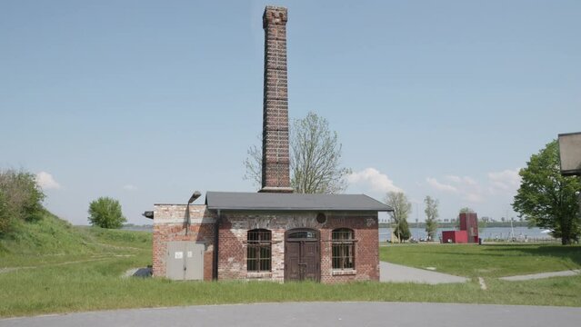 Exterior of Cukrownia Żnin Arche Hotel in old sugar factory in Poland. Tilt-up shot.