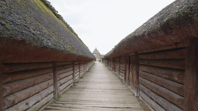 Rooftops Inside an archaeological site of Biskupin and a life-size model of a late Bronze Age fortified settlement in Poland