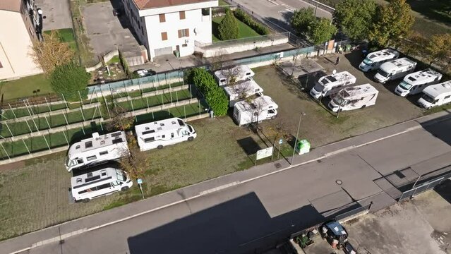 Motorhomes - Campervan Of Campers Rest Area In The Soave Town, Italy. - aerial orbit shot