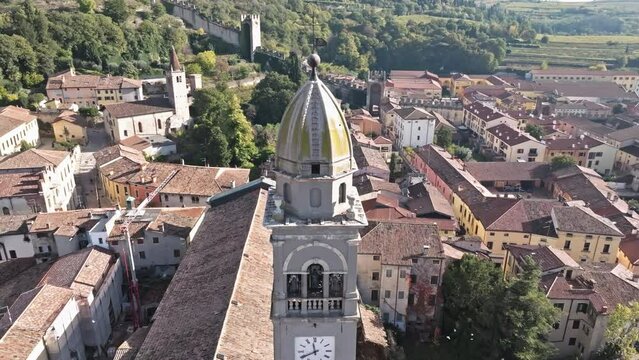 Cathedral of San Lorenzo Martire Clock And Bell Tower in Soave, Italy. - aerial shot