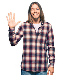 Handsome caucasian man with long hair wearing hipster shirt showing and pointing up with fingers number five while smiling confident and happy.