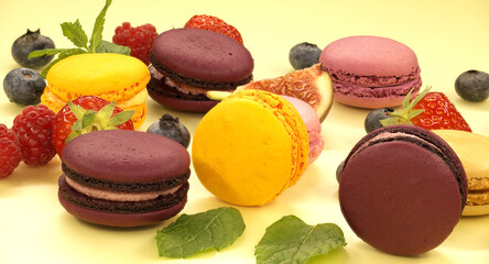 Vibrant scene of table filled with macaroons and fruits