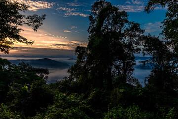 high angle nature background On the mountain overlooking the surrounding natural scenery, overlooking the sea, trees, rocks, trees, adventure tourism.