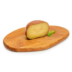 Hard cheese, on a wooden board, on a white background, insulator