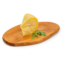 Hard cheese, triangular piece, on a white background, insulator