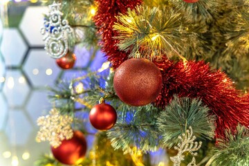 Background with blur on the theme of Christmas or New Year with toys and shining elements