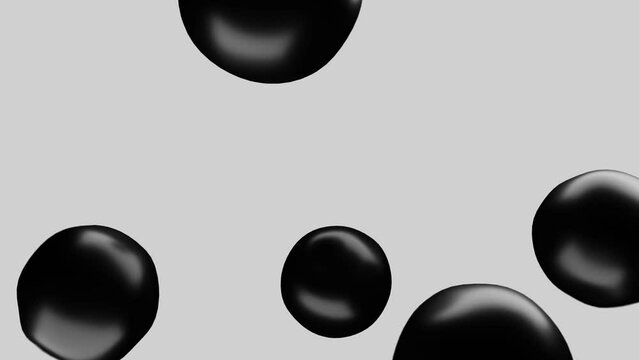 Black soft body bouncing spheres on white background