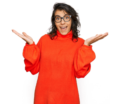 Young hispanic woman wearing casual clothes and glasses celebrating victory with happy smile and winner expression with raised hands - Powered by Adobe