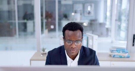 Business man, reading on computer and planning in office for online research and analysis on accounting software. African worker or accountant in glasses and vision for audit report or job solution