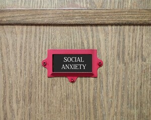 Drawer with tag label SOCIAL ANXIETY (social phobia) , intense fear of social situations or being...