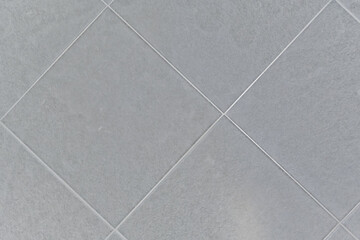 Gray floor tiles are resistant to stains and are easy to maintain