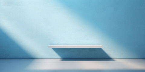 Empty blue colored wall and floor with lighting for product background.
