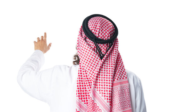 Back view of an Arab man in thobe standing on white isolated background