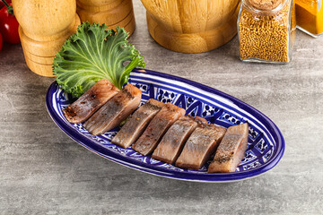 Sliced salted herring fillet snack