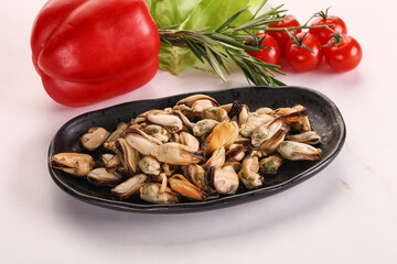 Marinated mussels in the bowl