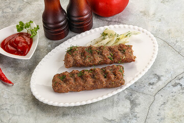 Kebab with beef served onion