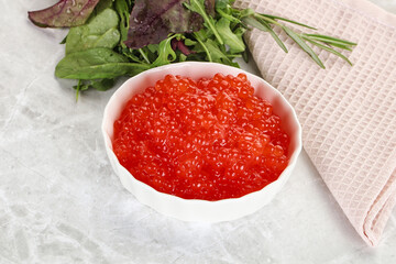 Red caviar in the bowl
