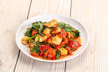 Chicken with tomato and spinach