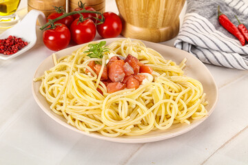 Pasta spaghetti with salmon and stracciatella