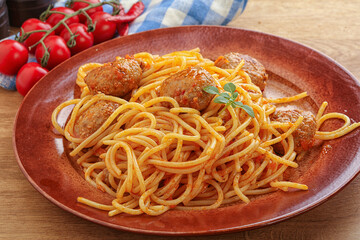 Spaghetti with meatball in tomato sause