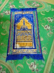 Colorful islamic  praying mat or  carpet with a pattern in the style of Khiva. photo taken in malaysia