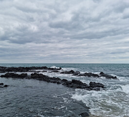 
This is the Jeju Island beach with rough waves.