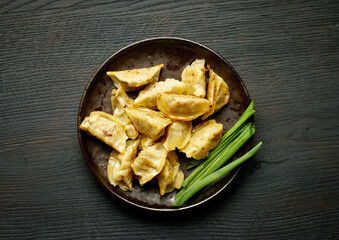 plate of asian dumplings