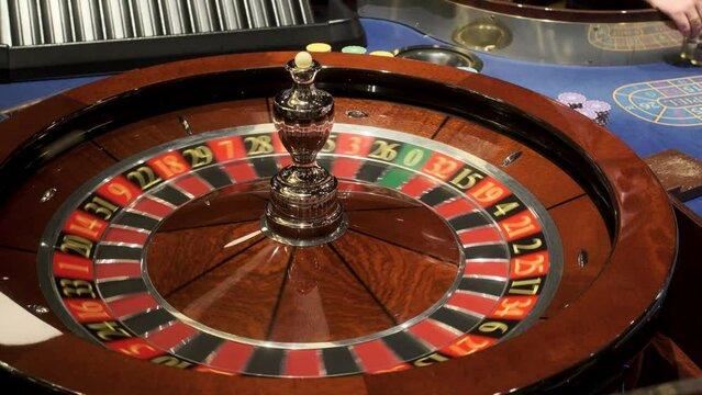 Batumi, Georgia - November 12 2023: Roulette players place their bets at an elite casino. Gambling, nightlife