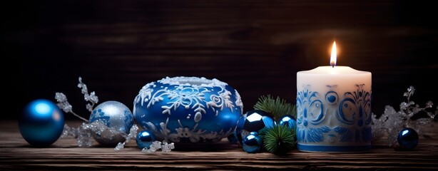 Blue christmas background with candles, balls and snowflakes.