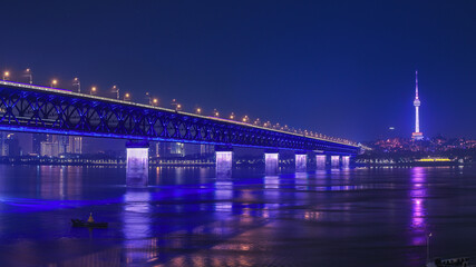 Wuhan Yangtze Bridge during blue hours. it is the first yangtze river bridge designed by engineers from Soviet Union in 1950s.