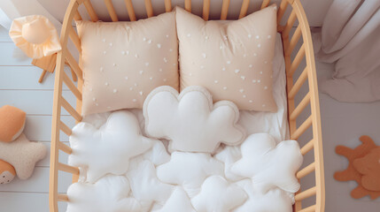 White wooden baby crib with pillows - obrazy, fototapety, plakaty
