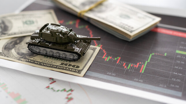 The main battle tank on US dollar bill banknotes background. U.S.A. and China trade war and currency war concept. U.S. fights against terrorism or sells arms weapons to other countries concept.