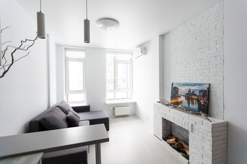 Old fashioned stylish bedroom with fireplace 