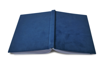 Opened old book facing down on floor, cut out isolated