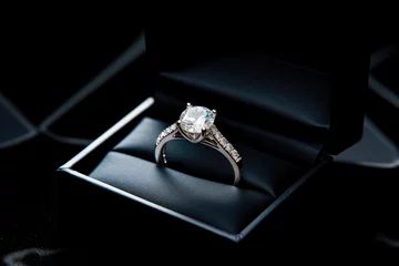 Foto op Canvas diamond ring in a box © VIRTUALISTIK