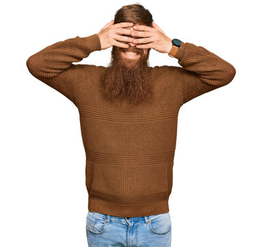 Young irish redhead man wearing casual clothes and glasses covering eyes with hands smiling cheerful and funny. blind concept.