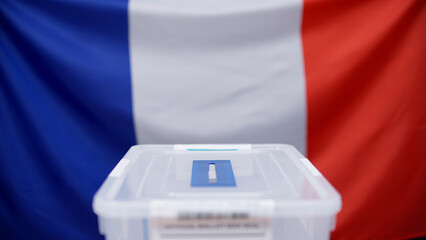 The flag of France and an official ballot box, representing elections in France and responsibility