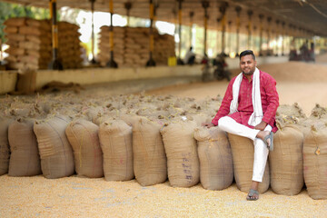 Corn is sold by farmers at the food grains market.