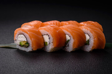 Delicious Philadelphia sushi roll with salmon, shrimp, cucumber and cream cheese