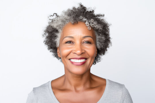 Portrait of an elderly african american woman smiling.