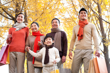 Chinese family shopping in autumn