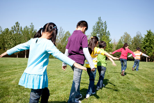 Children Playing Follow The Leader