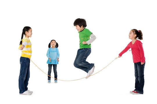 Group of friends playing jump rope