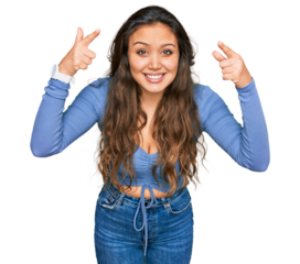 Young hispanic girl wearing casual clothes smiling pointing to head with both hands finger, great idea or thought, good memory
