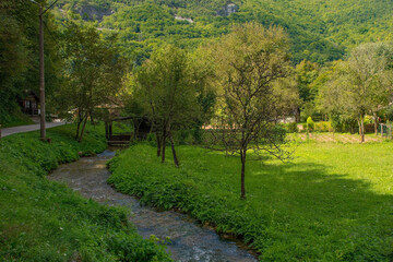 A small stream passing through Martin Brod village, Bihac, in the Una National Park. Una-Sana...