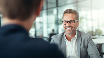 An approachable Head of Revenue Operations having a one-on-one meeting, Head of Revenue Operations, blurred background, with copy space