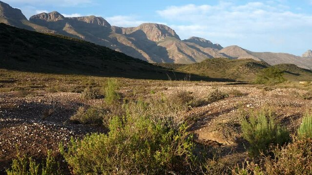 4k 30p footage of the beautiful Swartberg Mountains near the tiny hamlet of Klaarstroom at the northern entrance to Meiringspoort. Karoo. Western Cape. South Africa.