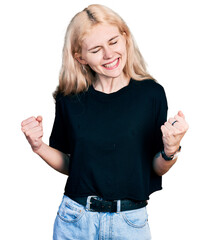 Fototapeta na wymiar Young caucasian woman wearing casual clothes excited for success with arms raised and eyes closed celebrating victory smiling. winner concept.